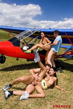 Two hot brunettes Jade Sin and Priva get penetrated by two guys right in the sun