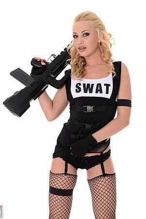 Charming uniform doll Lindsey Olsen opens her legs up and shows the sexy shaved cunt