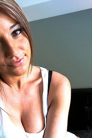 Blonde beauty Nikki Sims is showing the hand bra and tenderly squeezing boobs