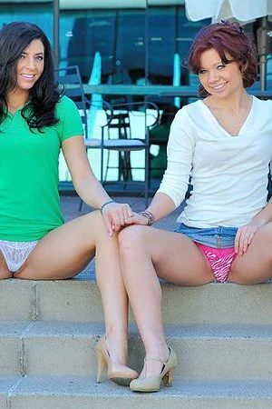 Lesbian girls Madeline FTV and Rita FTV take  off their panties and spread their snatches outdoors