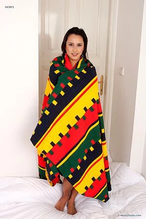 Cutie chick Edita Bente is coming out of shower in towel and then getting on the bed and posing nude