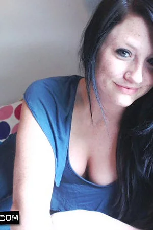 Softcore brunette Freckles knows what men want so she presents her boobs and juicy ass.