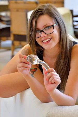 Nerdy brunette Shea Ii gets half naked to stuff her tight twat with a giant sex toy.