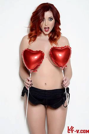 Seducing girlie with full body Lucy Vixen is playing with the balloons and her own big boobs