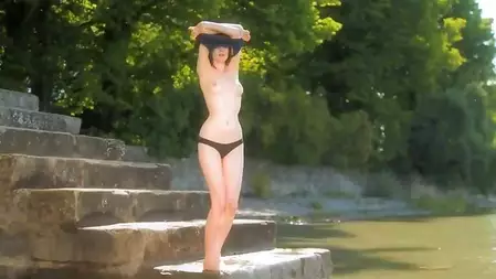 Well shaped babe Anna Leah is outdoor slowly losing off top and sexy panty