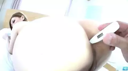Naughty Asian Ayumi Kobayashi has temperature measured in her ass and pussy banged