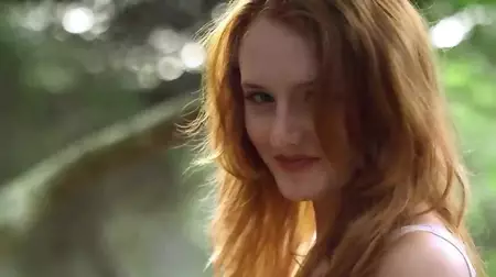 Redhead cutie Denisa Heaven invites you to follow her and enjoy the nude body show