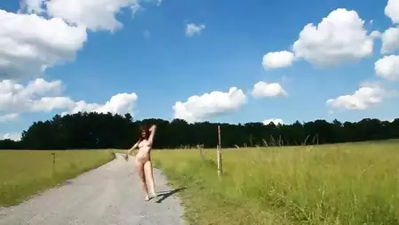 Teen darling Anna Tatu is posing naked outdoors on a hot summer day with pleasure.