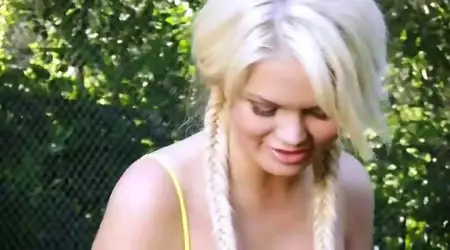 Cute naughty blonde Alexis Ford plays golf outside and teases with her impeccable body 