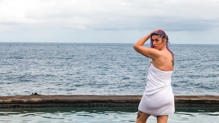 Horny bitch Cat Asstrophe masturbates by the water