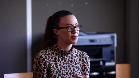 Dark-haired secretary with glasses gets fucked with her panties on