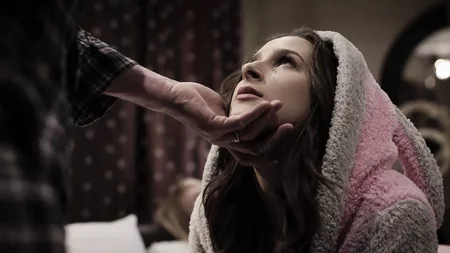 Busty brunette Ashley Adams gets fucked hard in bed