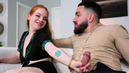 Petite redhead babe Amy Quinn pleasures her bearded BF on the couch