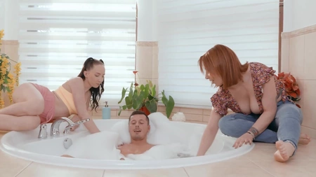 Bella Angel and Lucia Fernandez pleasuring lucky dude in the bathroom