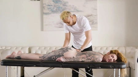 Lavishly tattooed slut Penny Archer gets fucked hard on the massage table