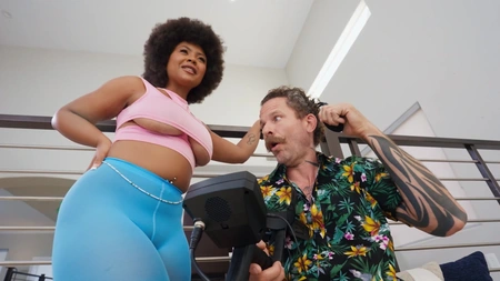 Curly-haired ebony with big juggs rides Scott's pecker through the hole in her pants